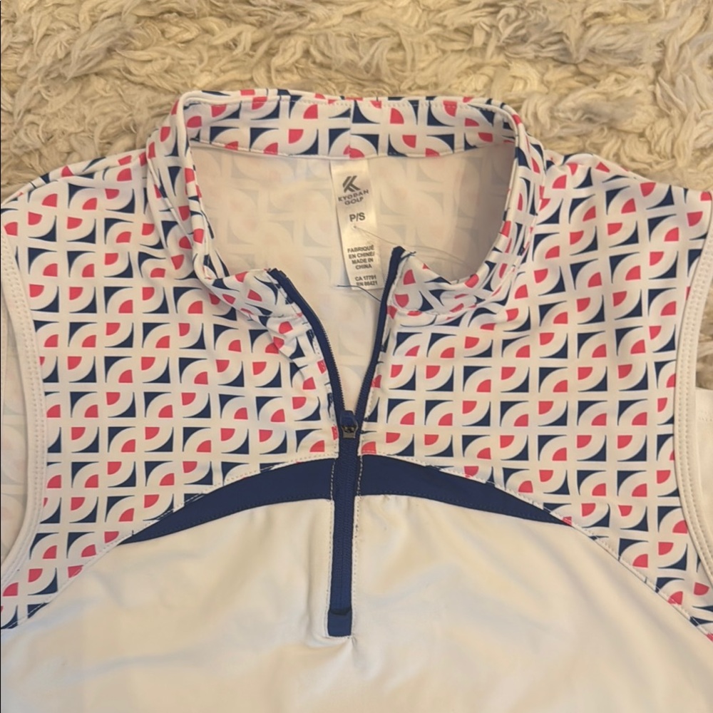Sleeveless White and Navy Golf Outfit
Skirt with attached shorts - Picture 4 of 5